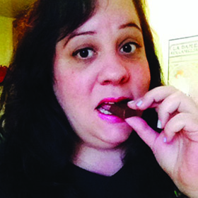 golda eating chocolate